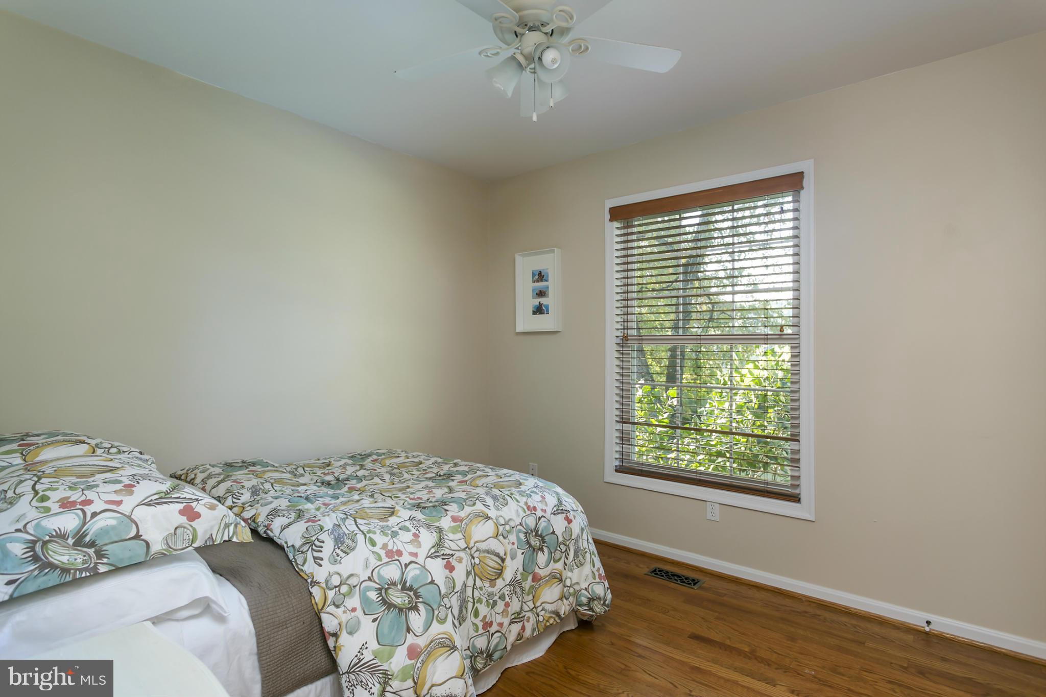 14921 Harrisville Road Mount Airy, MD 21771 - Photo 19 of 28 a bedroom with a bed and a window