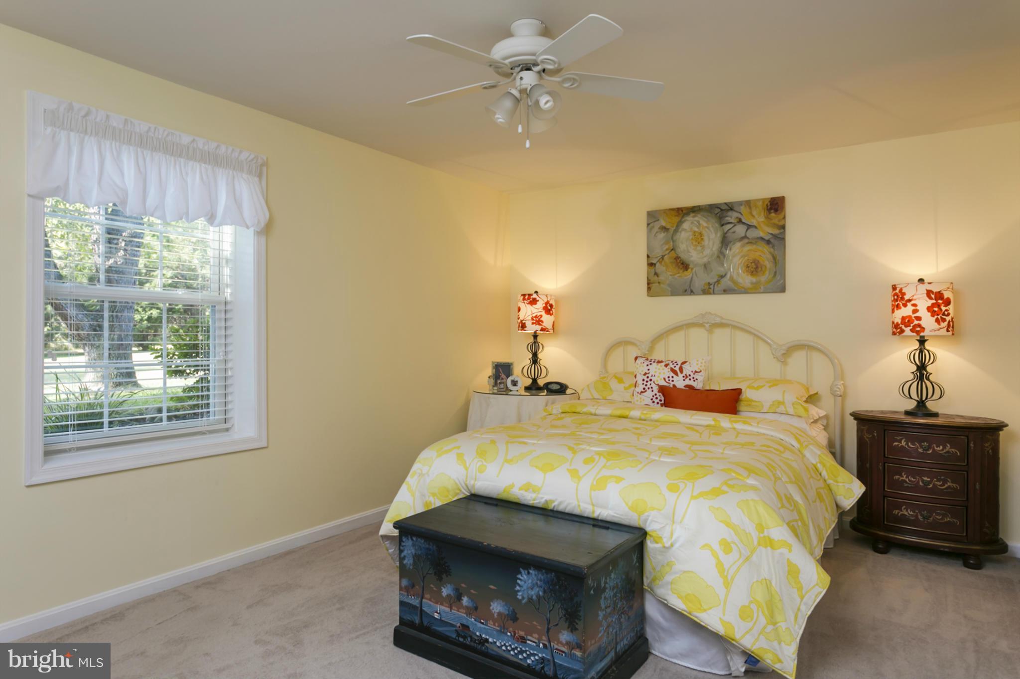 14921 Harrisville Road Mount Airy, MD 21771 - Photo 20 of 28 a bed sitting in a bedroom next to a window