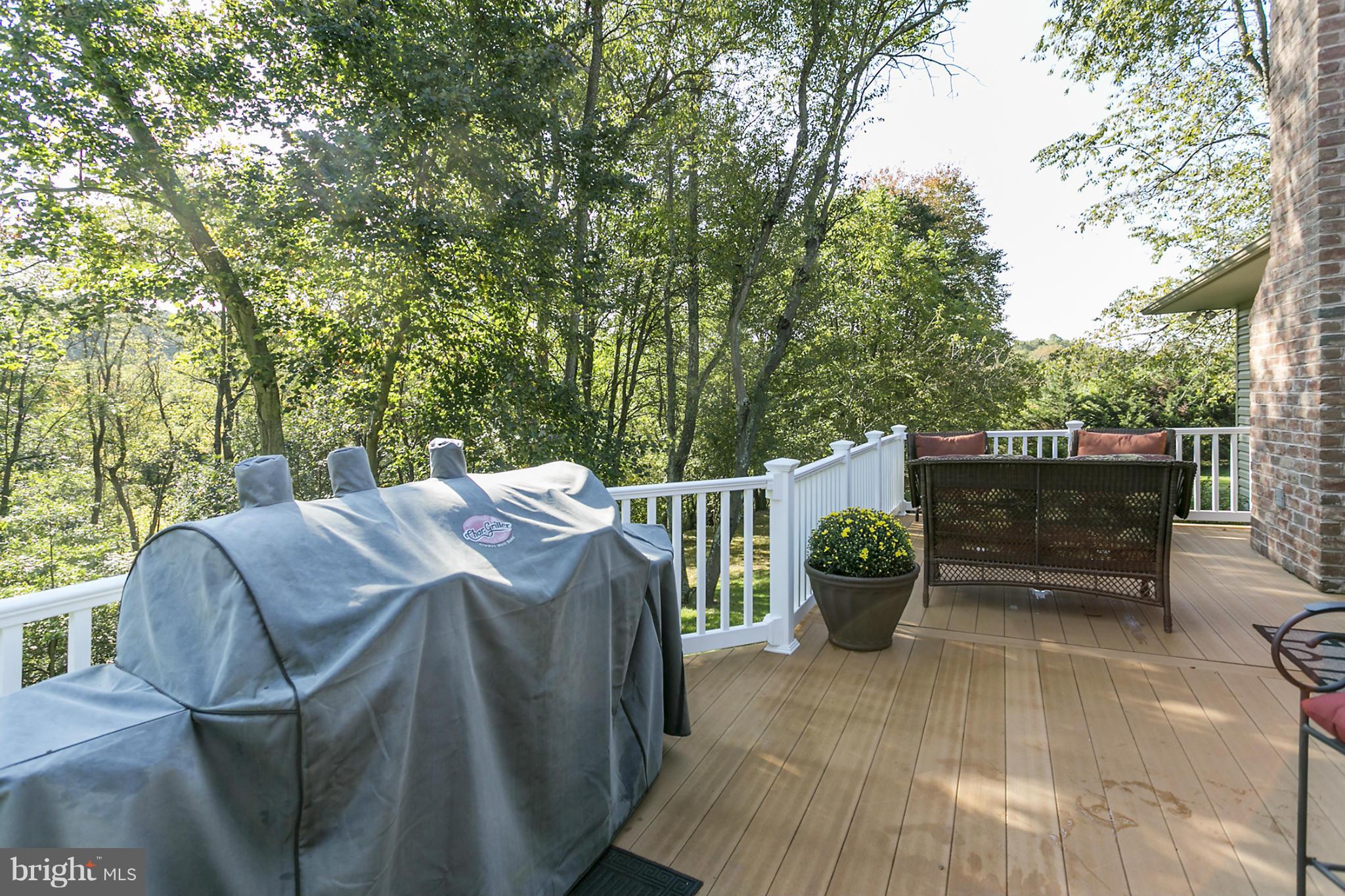 14921 Harrisville Road Mount Airy, MD 21771 - Photo 27 of 28 a view of a roof deck with furniture and potted plants