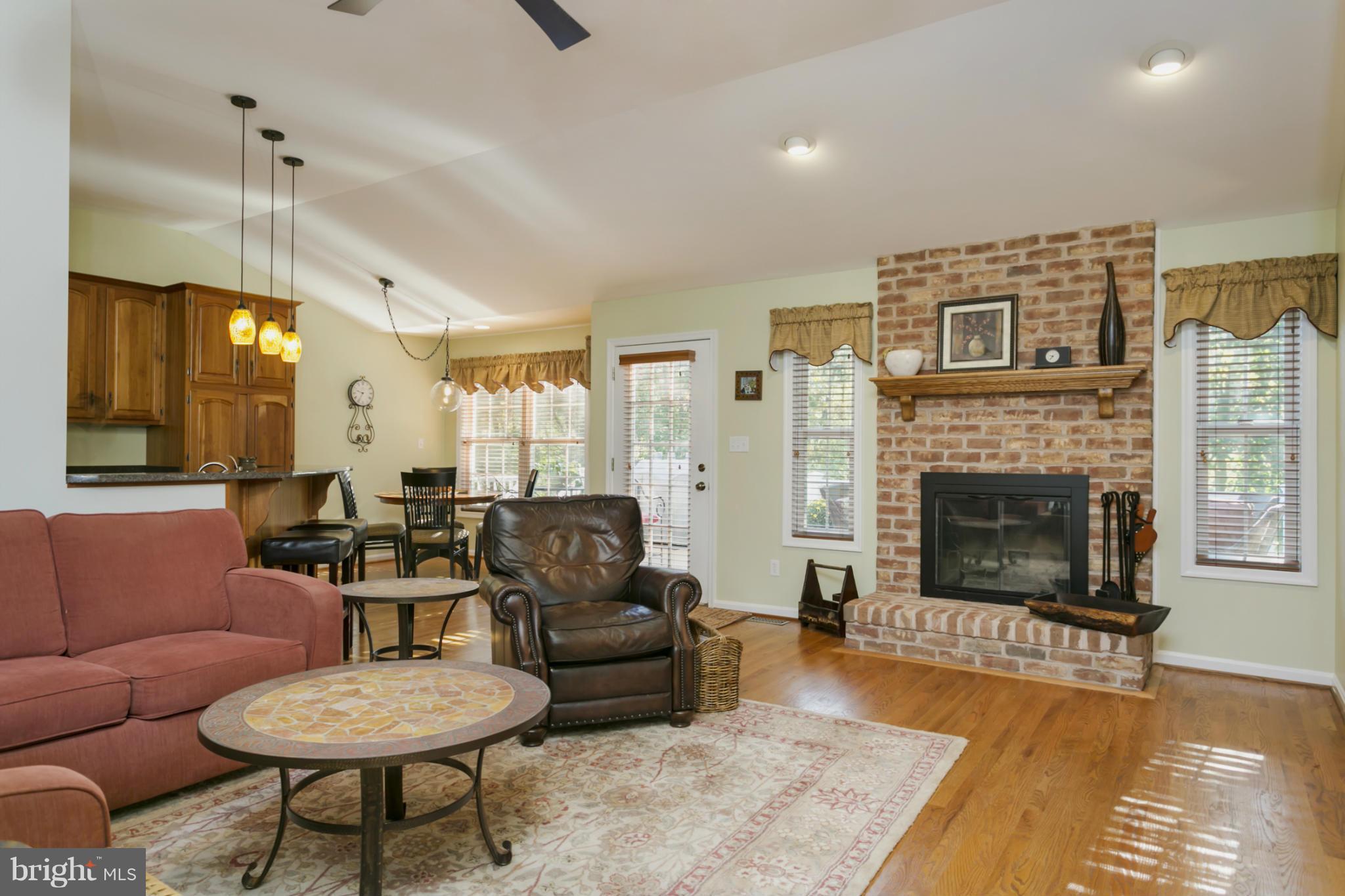 14921 Harrisville Road Mount Airy, MD 21771 - Photo 6 of 28 a living room with furniture and a fireplace