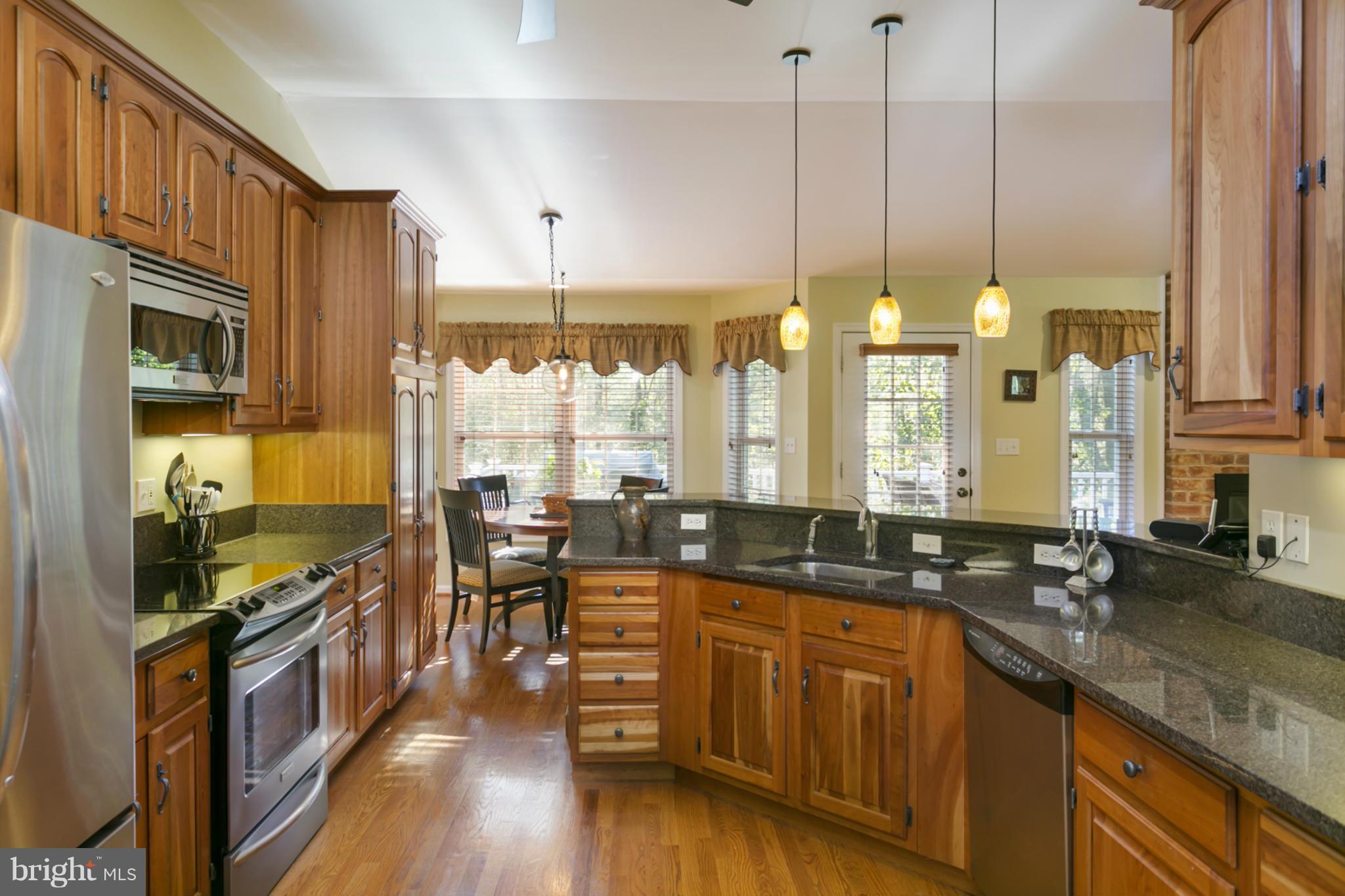 14921 Harrisville Road Mount Airy, MD 21771 - Photo 7 of 28 a large kitchen with lots of counter space