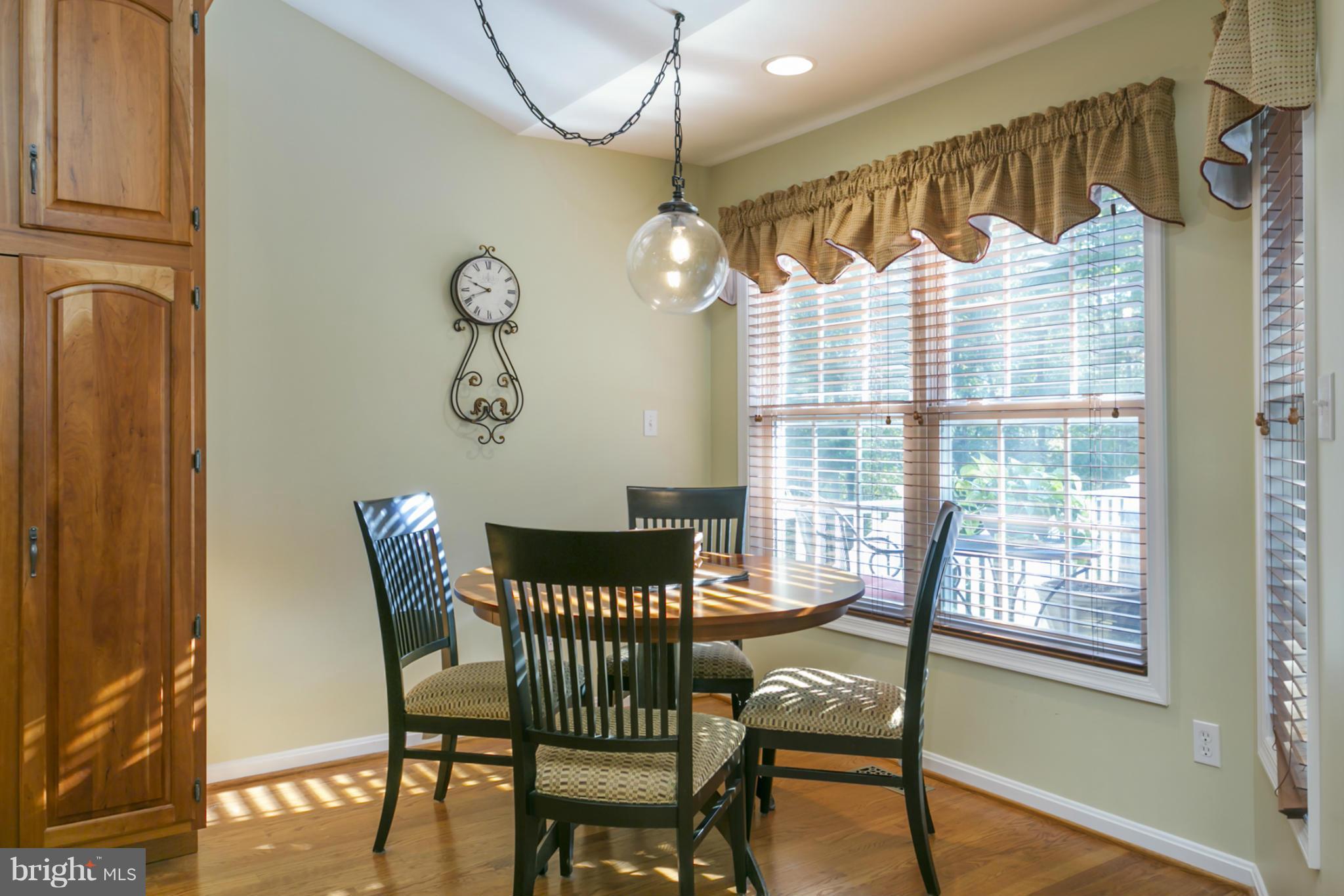 14921 Harrisville Road Mount Airy, MD 21771 - Photo 10 of 28 a view of a dining room with furniture window and wooden floor