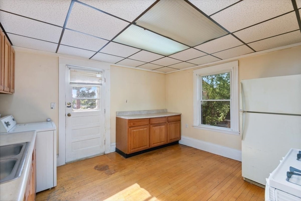 98 Webster Street Haverhill, MA 01830 - Photo 24 of 42 a room with furniture and window