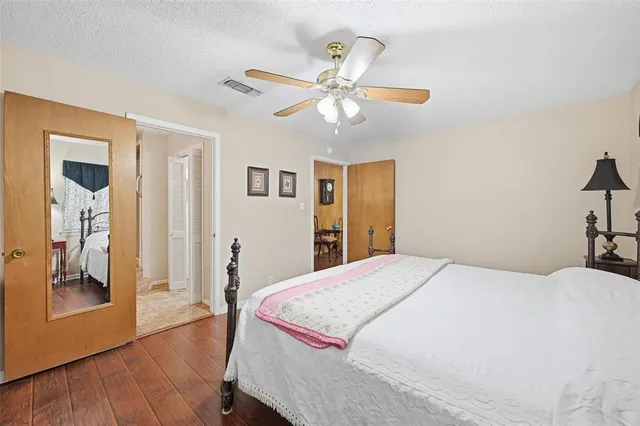 a view of kitchen island with stainless steel appliances granite countertop sink stove and refrigerator