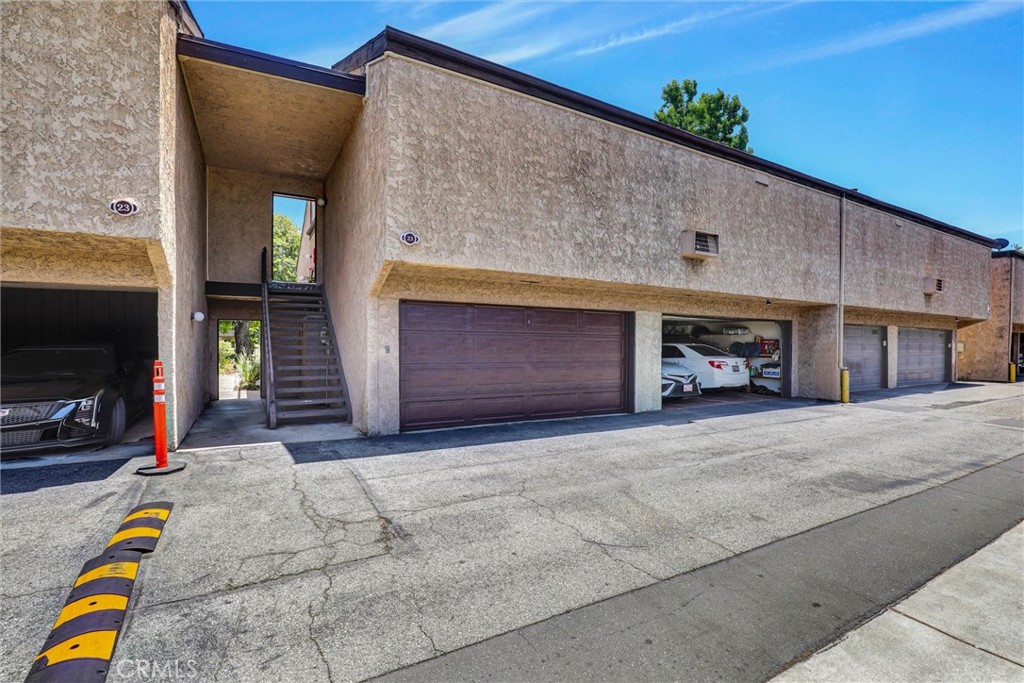 7890 East Spring Street, Unit 23H Long Beach, CA 90815 - Photo 32 of 39 Corner 2 car garage