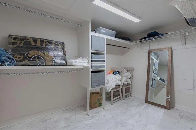 a view of a storage & utility room with racks