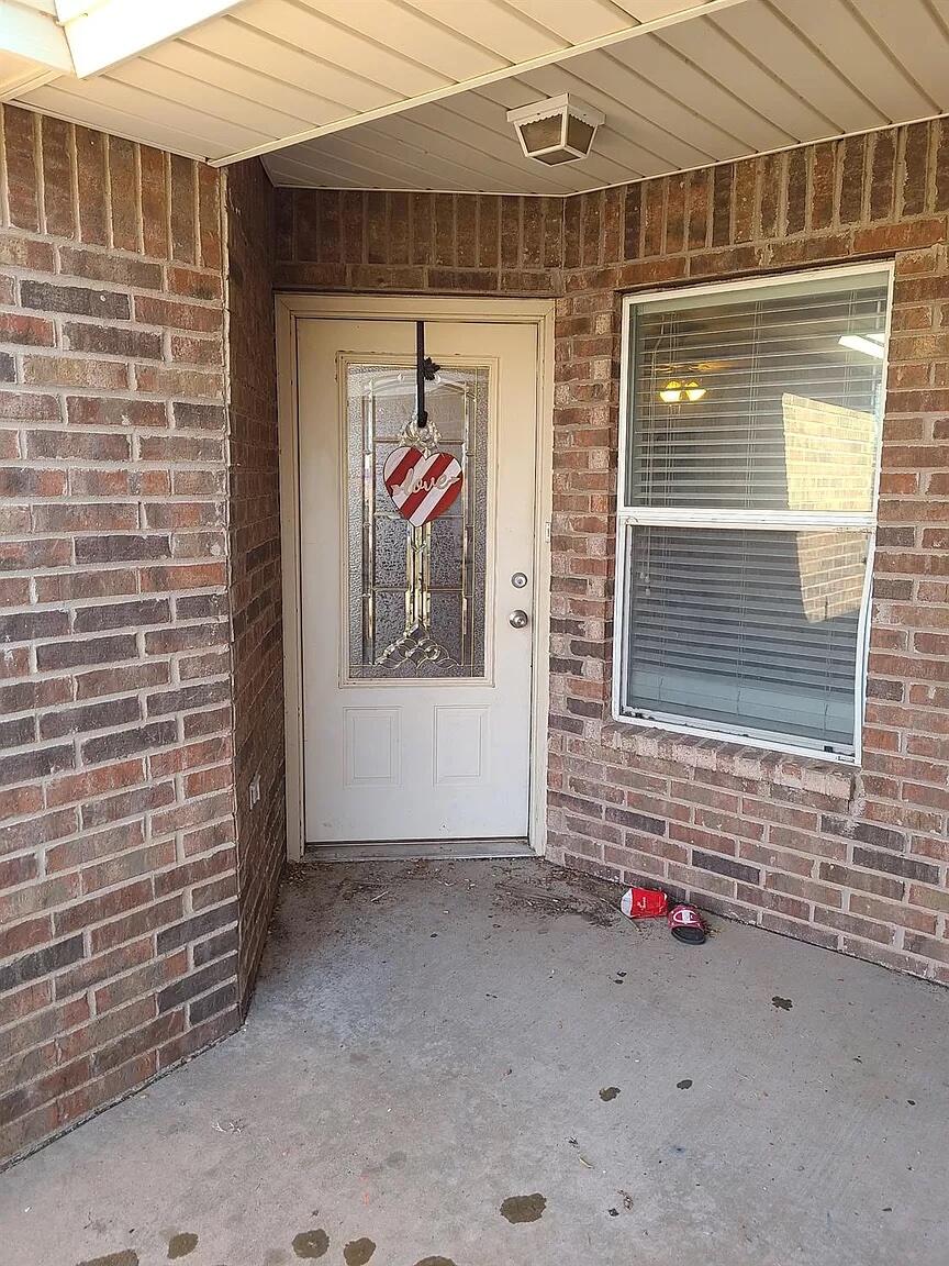 304 North Clinton Avenue, Unit A Lubbock, TX 79416 - Photo 15 of 24 a view of entrance to house