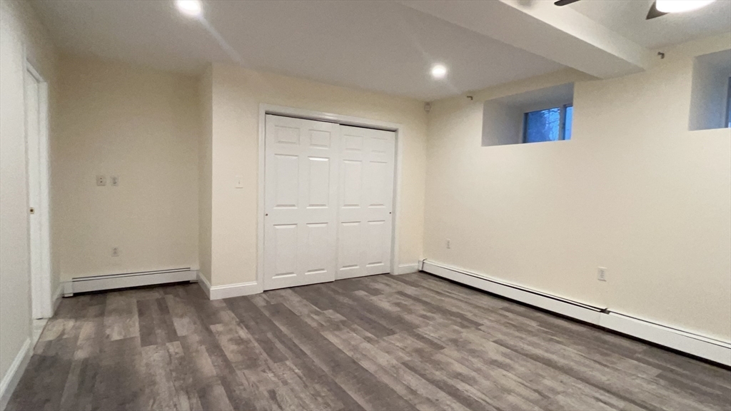 415 Pearl Street Stoughton, MA 02072 - Photo 10 of 24 a view of empty room with wooden floor