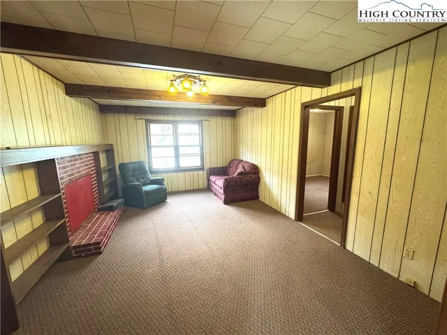 a view of livingroom with furniture and windows