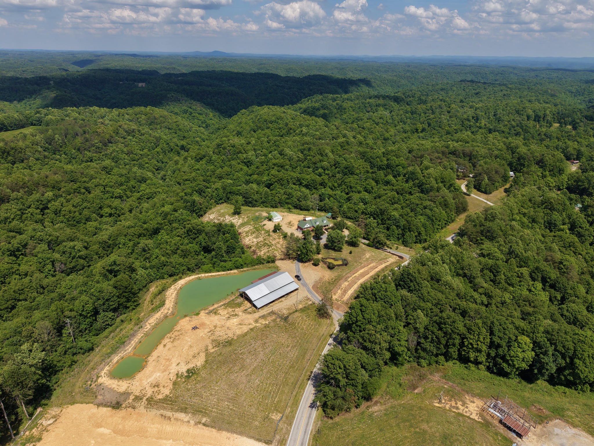 6701 McCormick Ridge Road Whitleyville, TN 38588 - Photo 2 of 63 a view of a lake with a yard