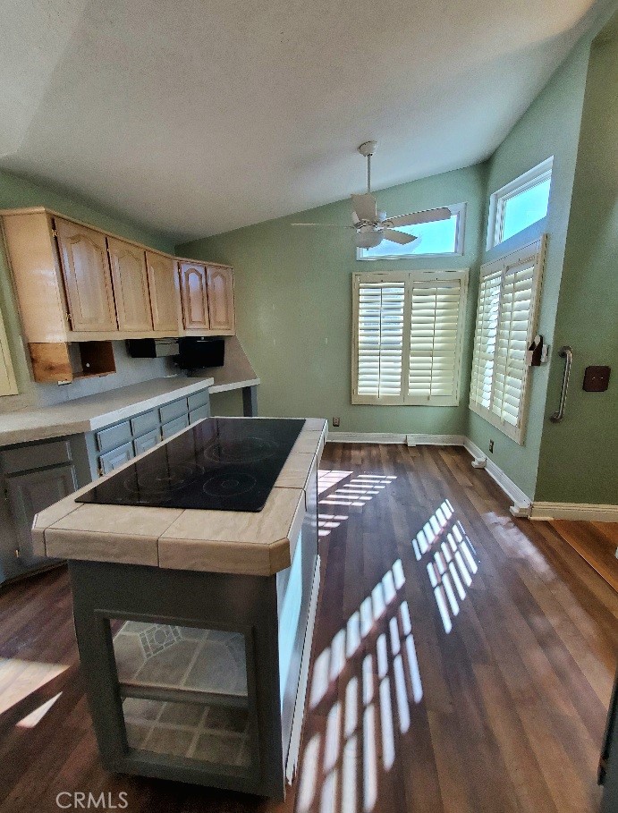12550 Main Street, Unit 31 Hesperia, CA 92345 - Photo 19 of 50 a kitchen with a sink a stove and cabinets