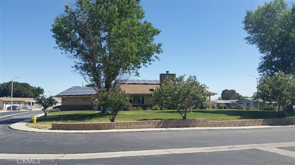 12550 Main Street, Unit 31 Hesperia, CA 92345 - Photo 46 of 50 a front view of a house with a yard