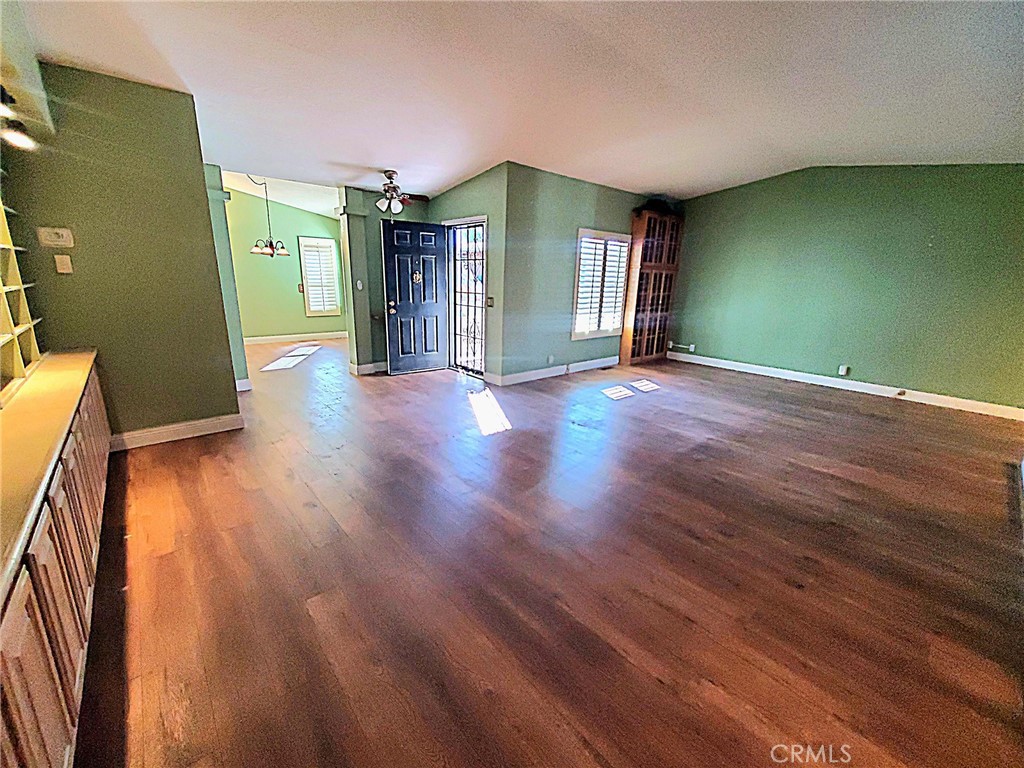 12550 Main Street, Unit 31 Hesperia, CA 92345 - Photo 8 of 50 wooden floor in an empty room with a window