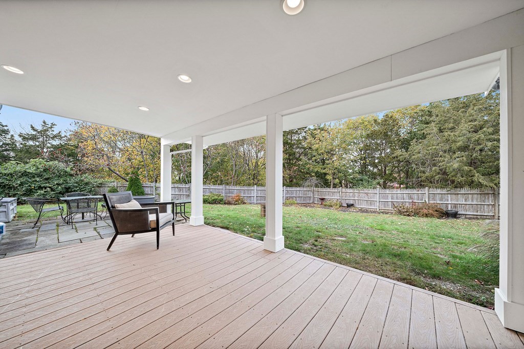 20 Spring Valley Road Hull, MA 02045 - Photo 20 of 30 a view of a deck with chair and wooden floor