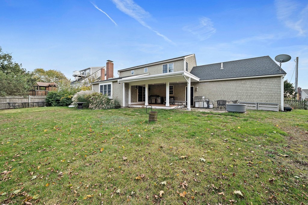 20 Spring Valley Road Hull, MA 02045 - Photo 22 of 30 a front view of a house with a yard