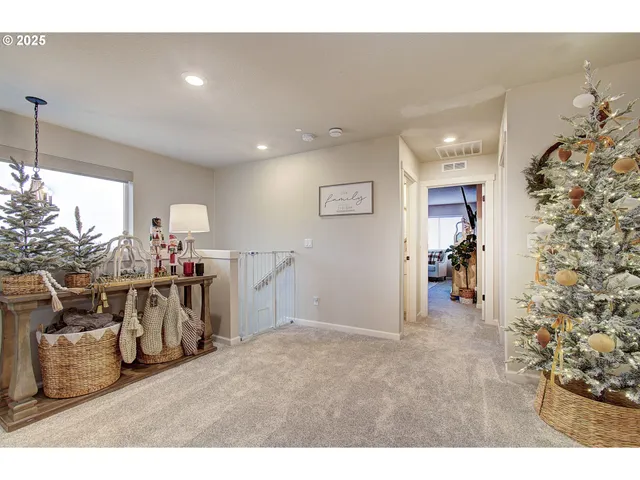 a view of a livingroom with furniture and a window
