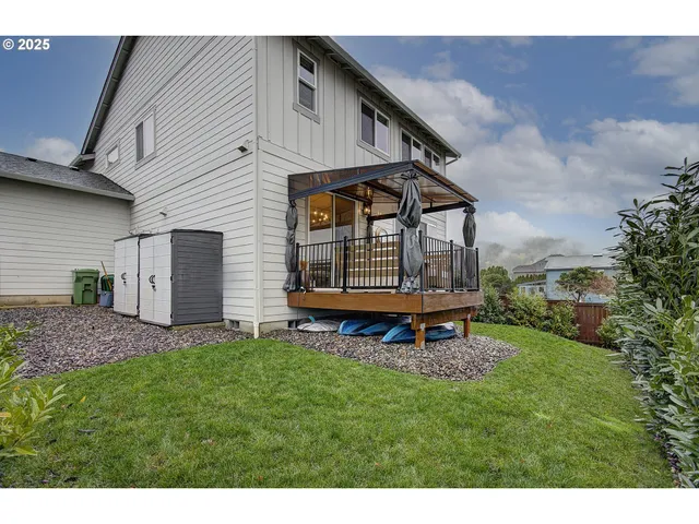a garden with wooden fence