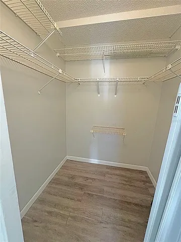 a garden view with a playing court