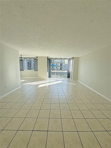a kitchen with stainless steel appliances a refrigerator sink and cabinets