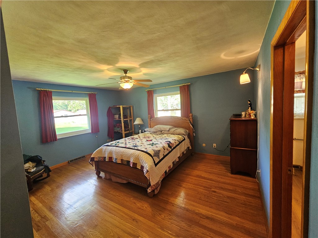 3998 Willowcrest Road Beavercreek, OH 45430 - Photo 18 of 41 This spacious room features ample natural light and beautiful hardwood flooring.