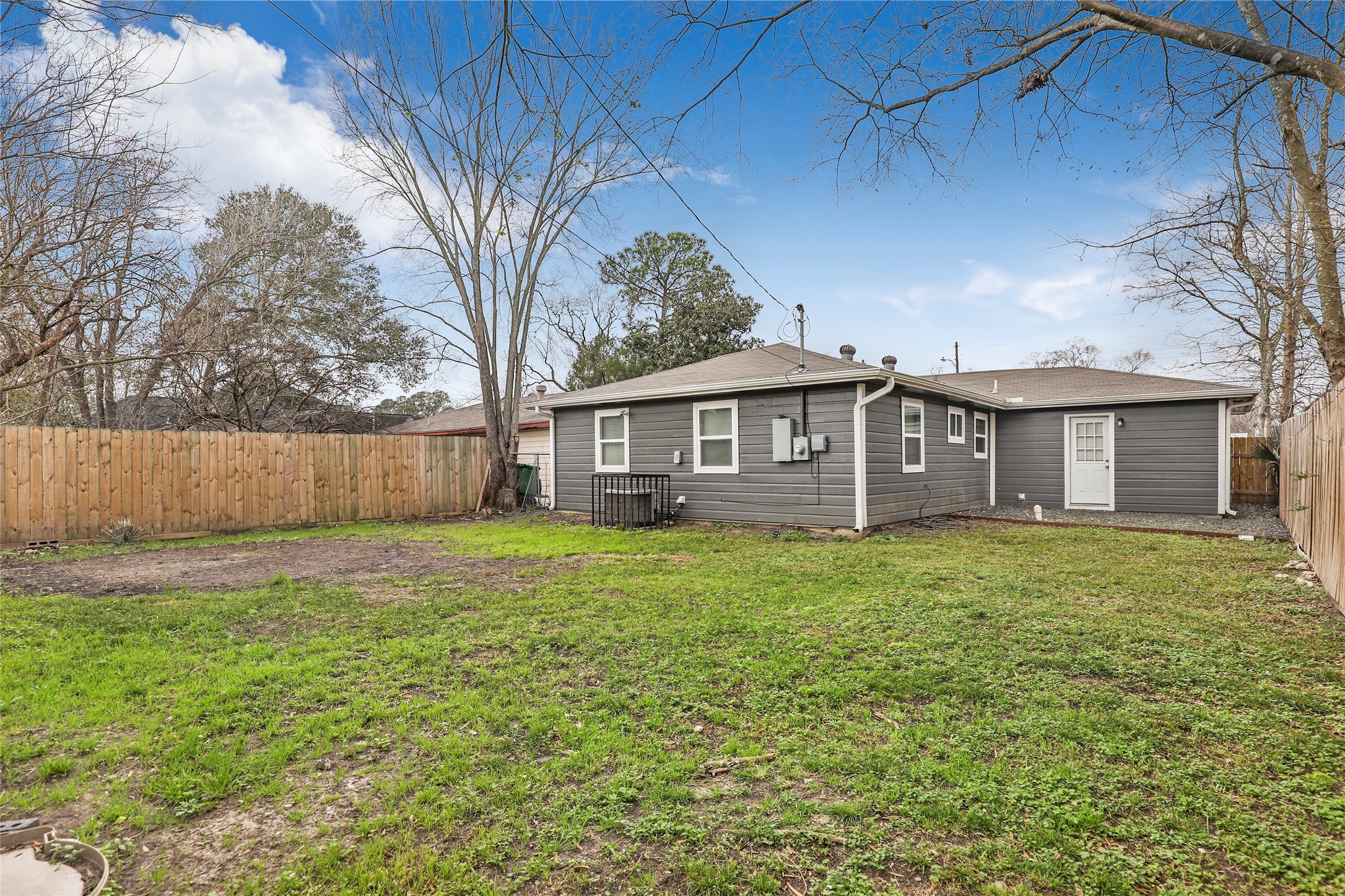 6721 Madrid Street Houston, TX 77021 - Photo 19 of 19 a backyard of a house with lots of green space