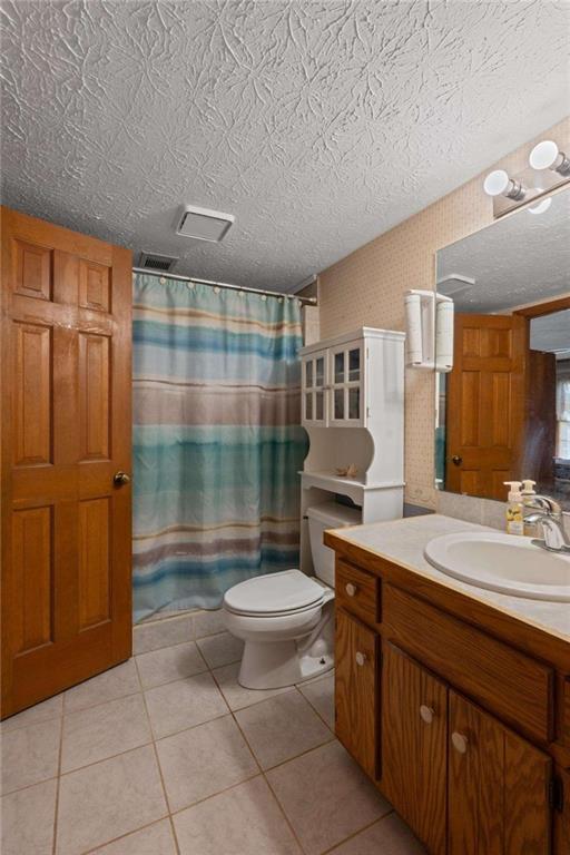 125 Circle Drive Hampton, GA 30228 - Photo 12 of 36 a bathroom with a sink toilet and shower