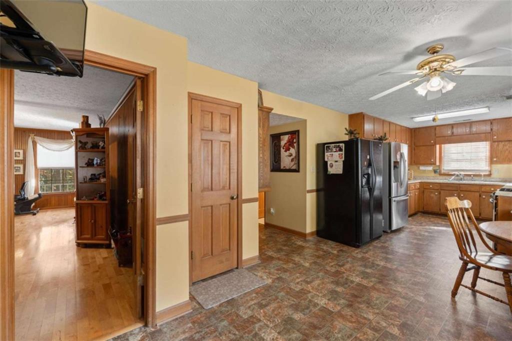 125 Circle Drive Hampton, GA 30228 - Photo 21 of 36 a view of a livingroom with kitchen and furniture