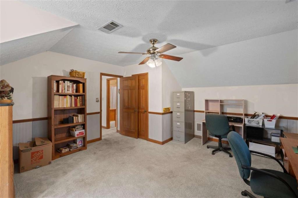 125 Circle Drive Hampton, GA 30228 - Photo 27 of 36 a view of a workspace with furniture