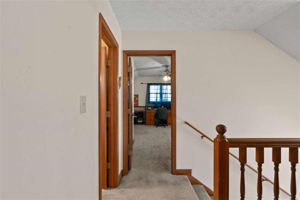 125 Circle Drive Hampton, GA 30228 - Photo 29 of 36 a view of a hallway and a livingroom with furniture