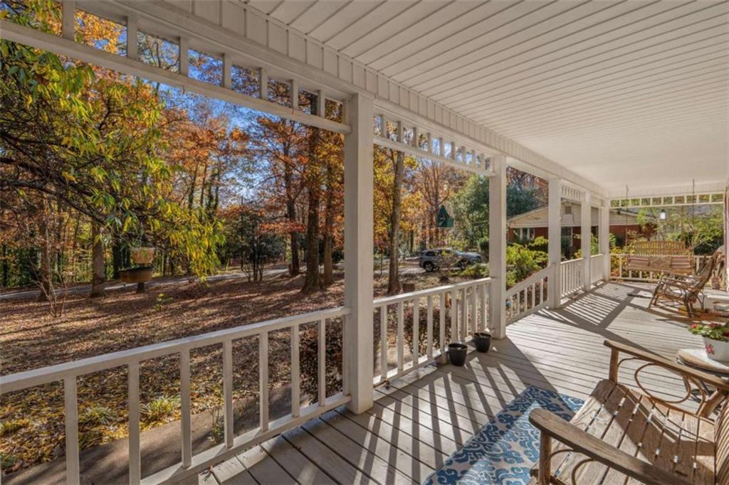 125 Circle Drive Hampton, GA 30228 - Photo 32 of 36 a view of a patio with couches chairs and wooden floor