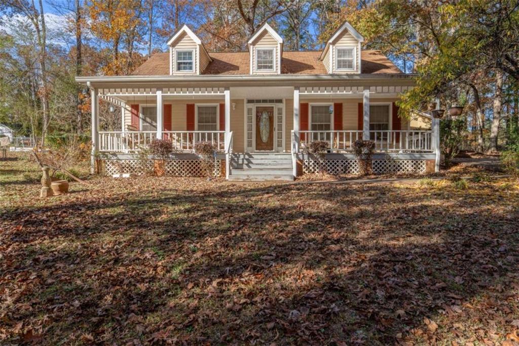 125 Circle Drive Hampton, GA 30228 - Photo 33 of 36 a front view of a house with yard