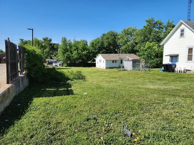 a house view with a garden space