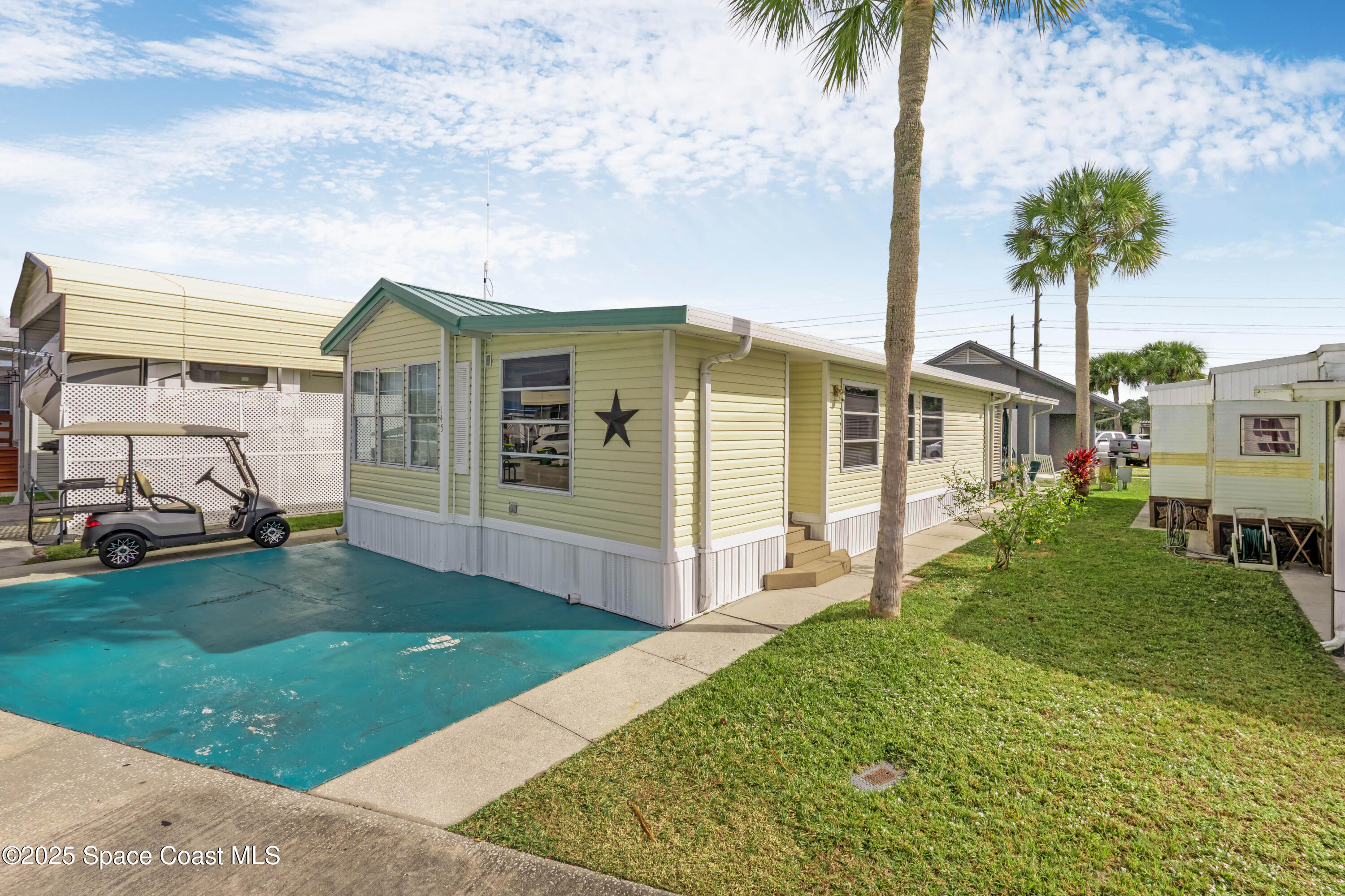 145 Forest Lake Drive Cocoa, FL 32926 - Photo 1 of 25 Front