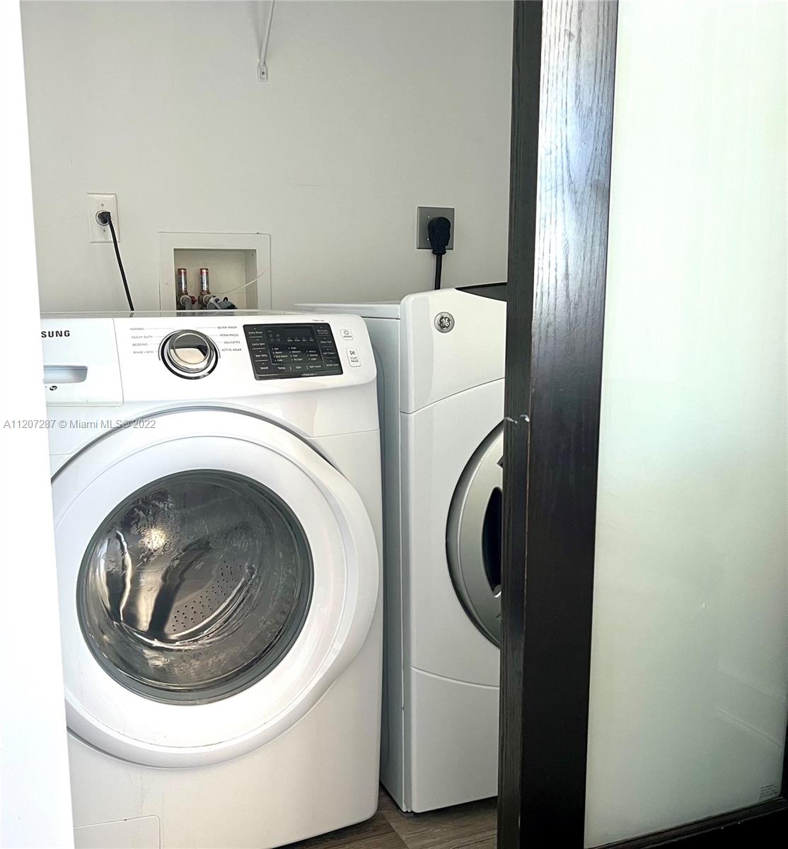 1500 Bay Road, Unit 1414S Miami Beach, FL 33139 - Photo 11 of 23 a utility room with dryer and washer