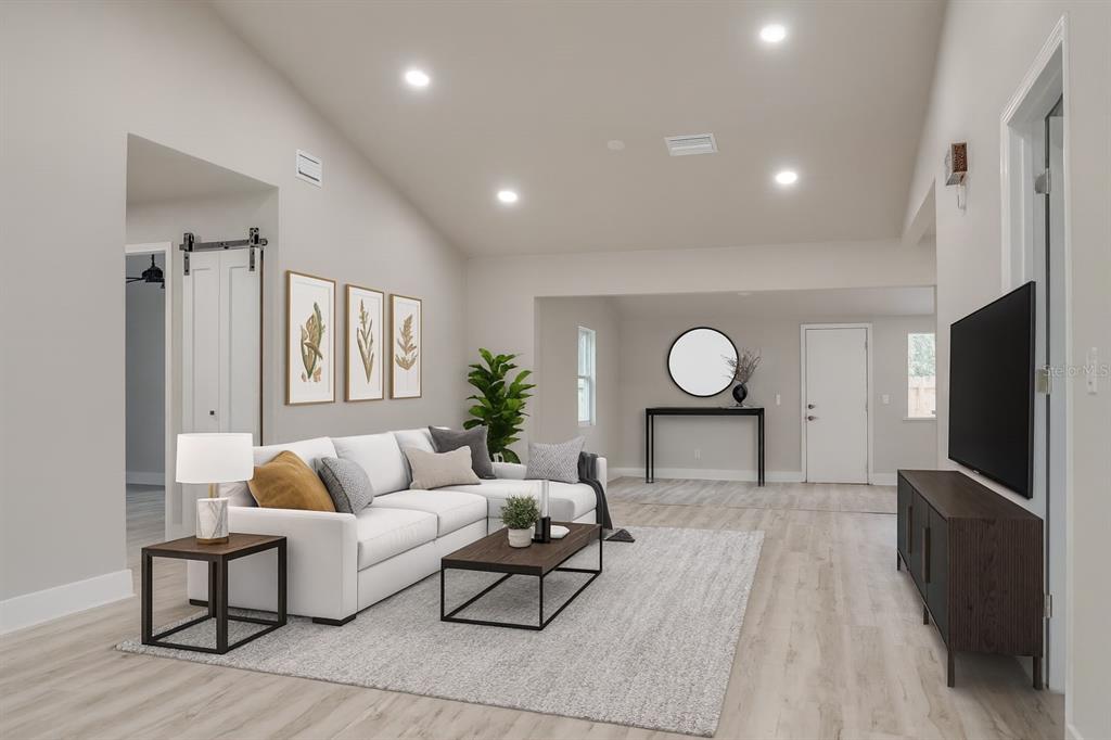 773 Bryant Road Palm Bay, FL 32908 - Photo 4 of 11 a living room with furniture fireplace and a window