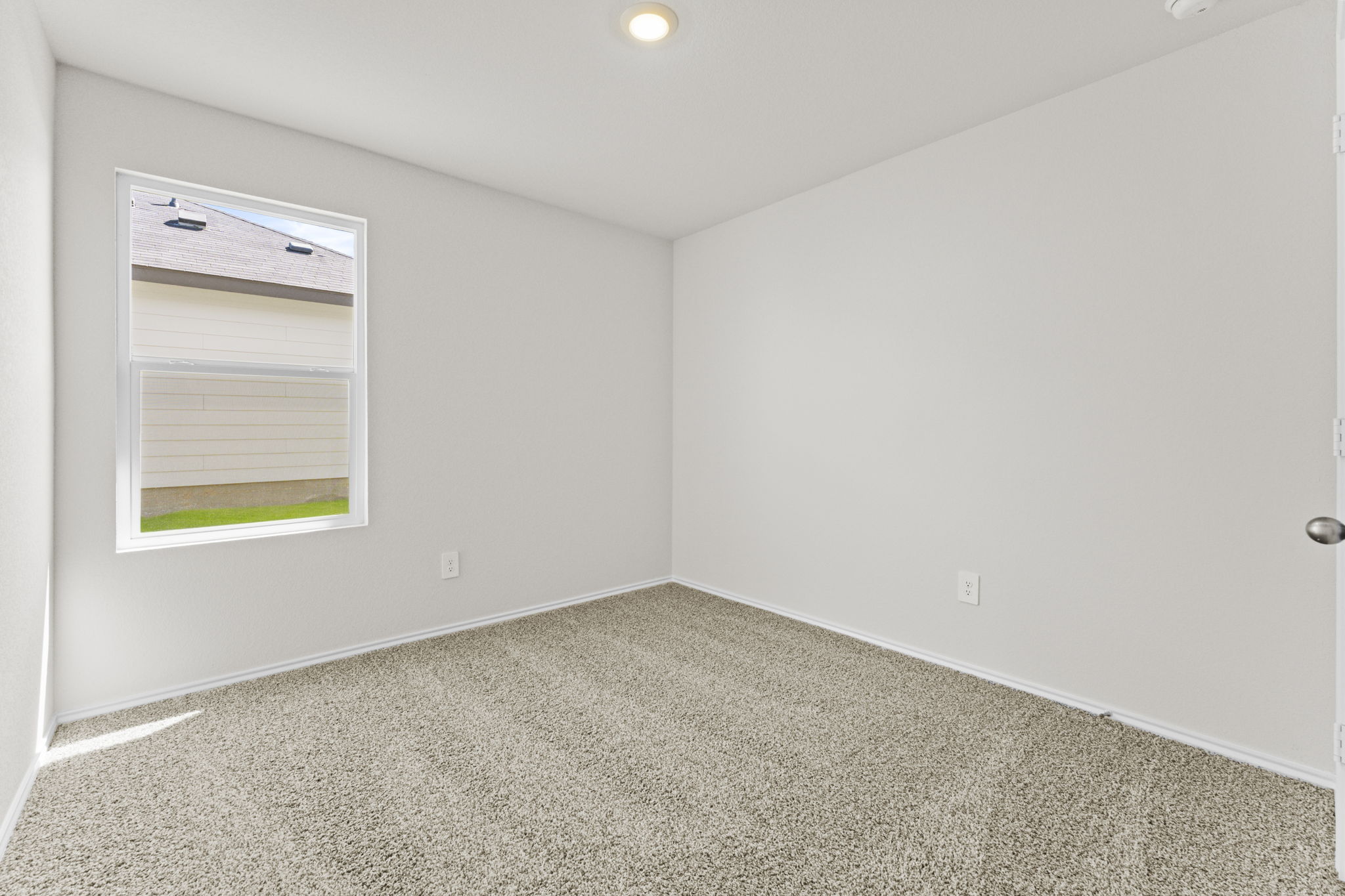 401 Wild Goose Drive Luling, TX 78648 - Photo 12 of 26 a view of an empty room with a window