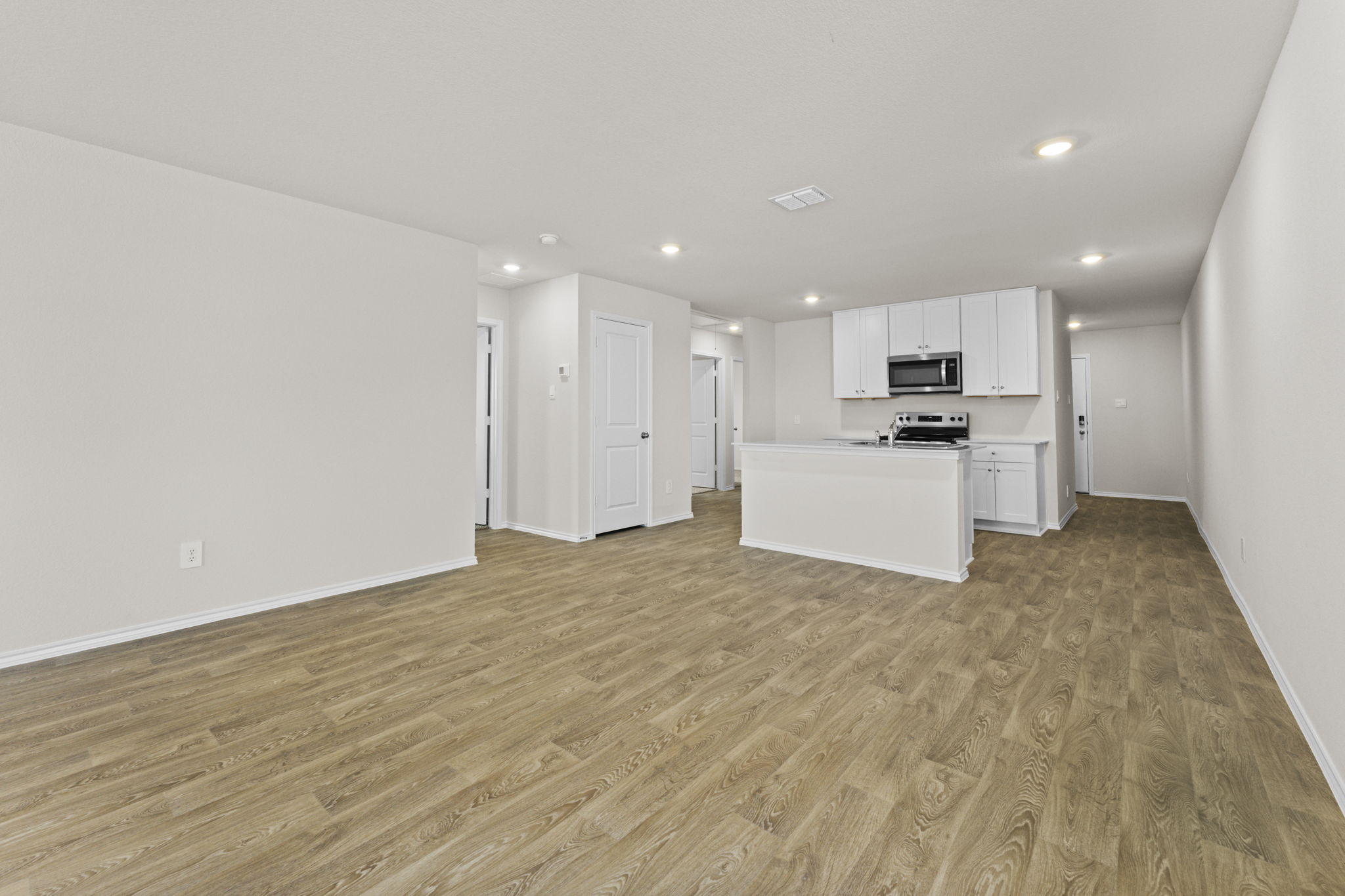 401 Wild Goose Drive Luling, TX 78648 - Photo 18 of 26 a view of kitchen with wooden floor