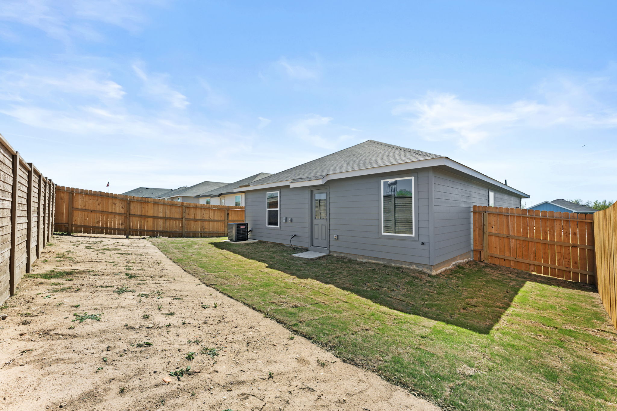 401 Wild Goose Drive Luling, TX 78648 - Photo 25 of 26 a view of a backyard of the house