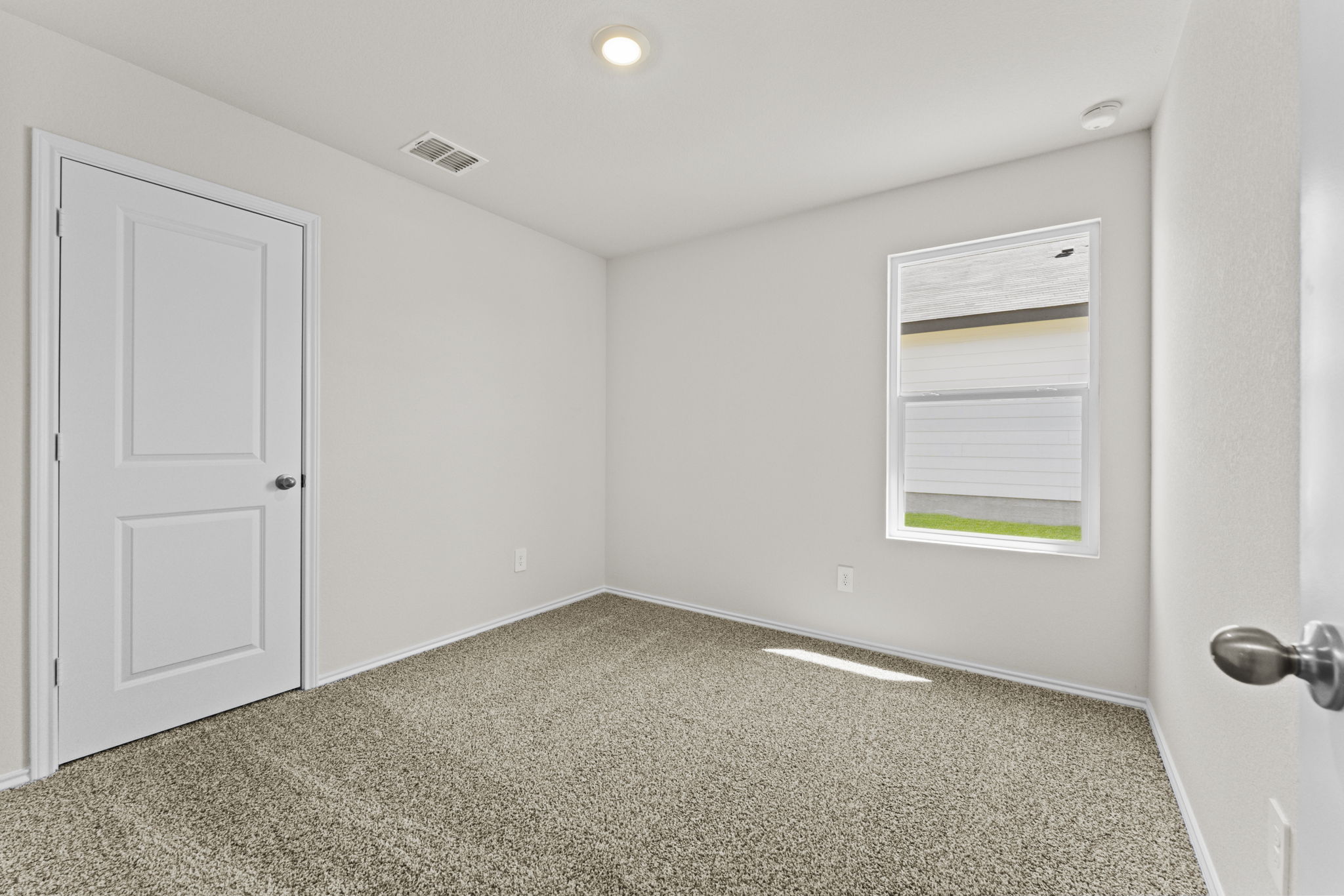 401 Wild Goose Drive Luling, TX 78648 - Photo 10 of 26 a view of an empty room with a window