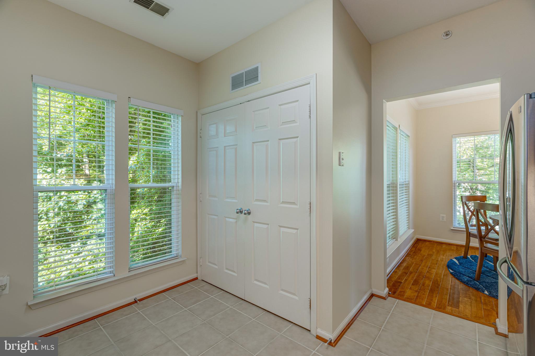 1511 North Point Drive, Unit 303 Reston, VA 20194 - Photo 14 of 29 Kitchen looking to the dining room