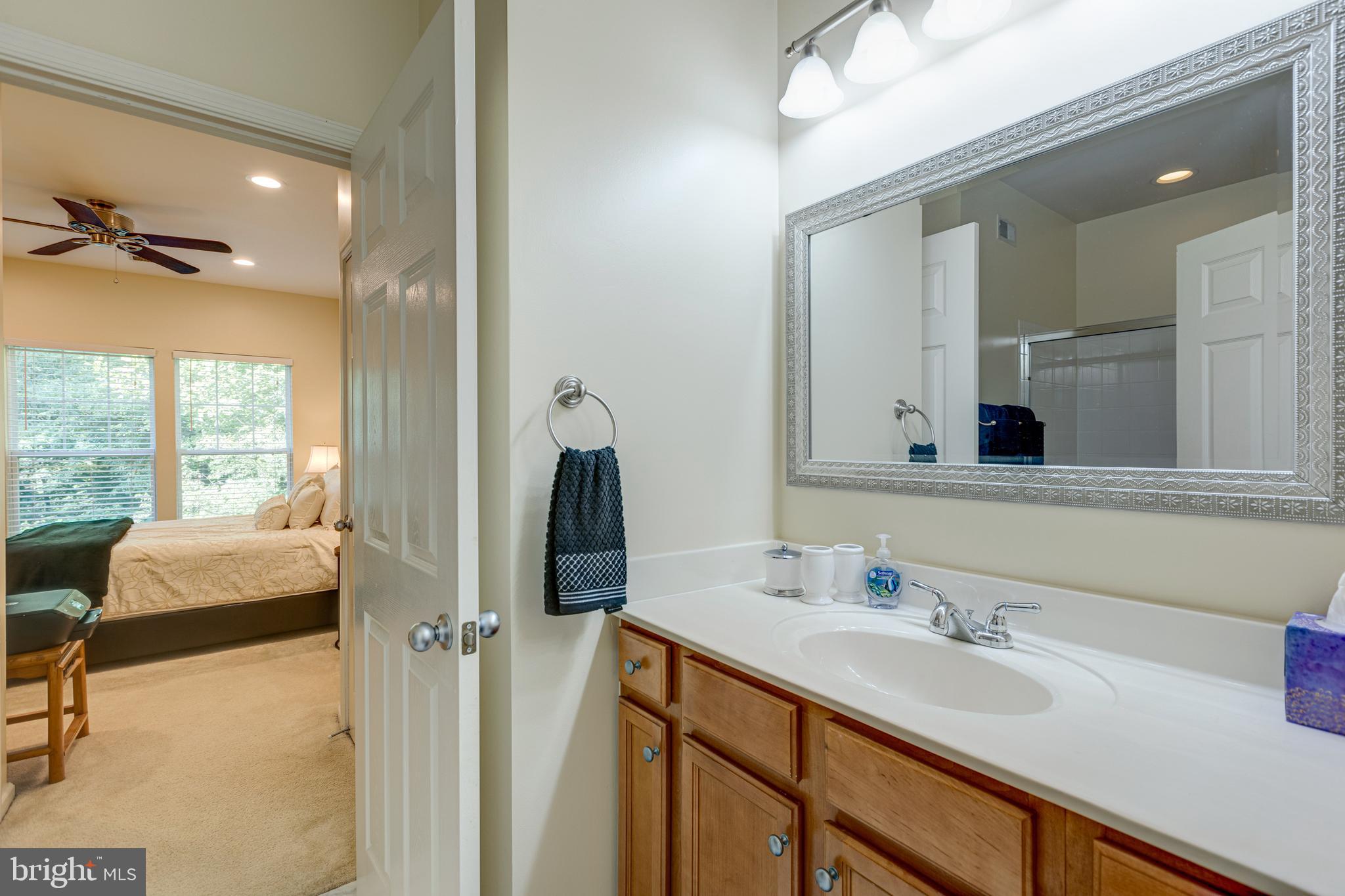 1511 North Point Drive, Unit 303 Reston, VA 20194 - Photo 21 of 29 Secondary bath and bedroom