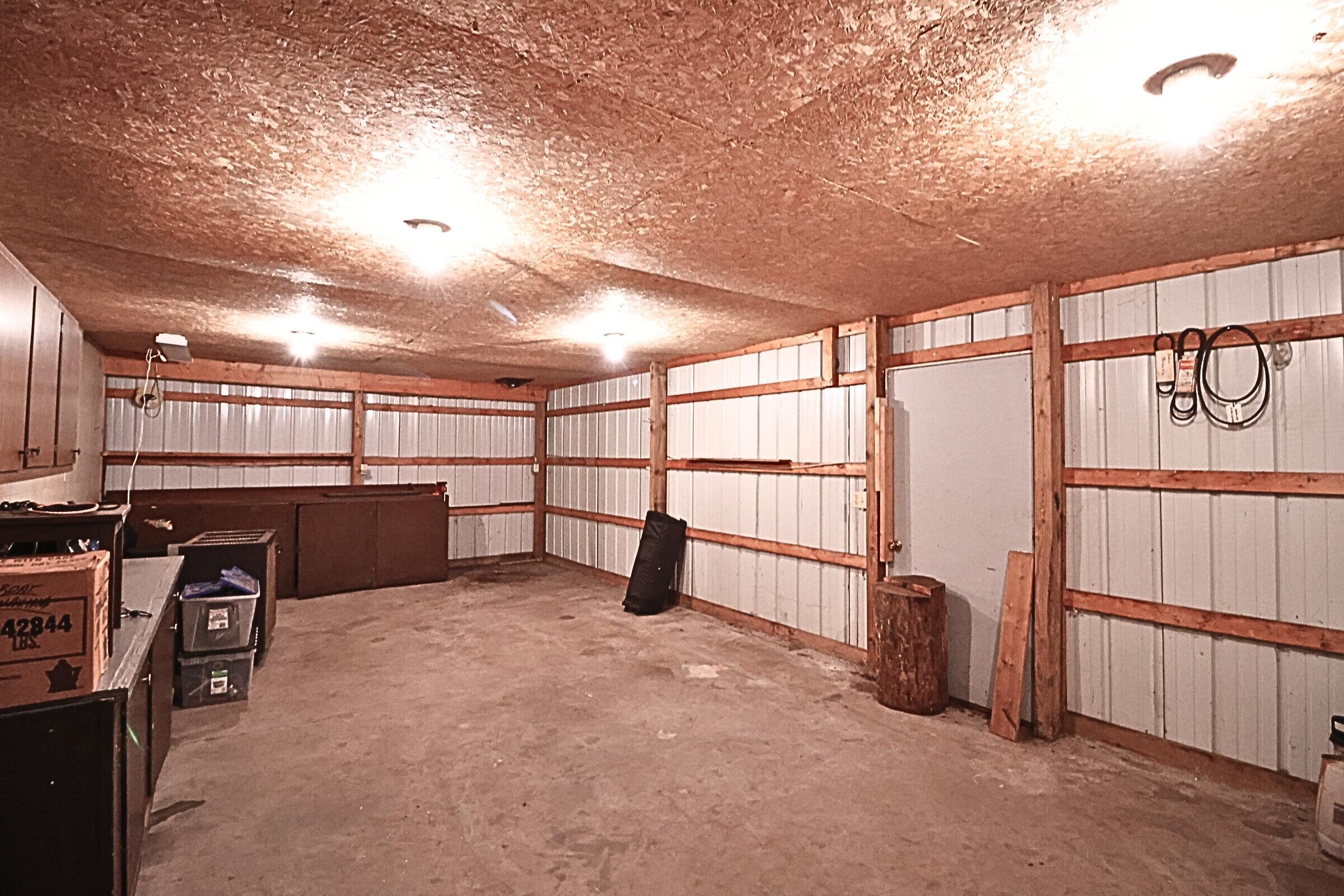 1278 West Pine Tree Road Luther, MI 49656 - Photo 19 of 29 Pole Barn 1 car garage side