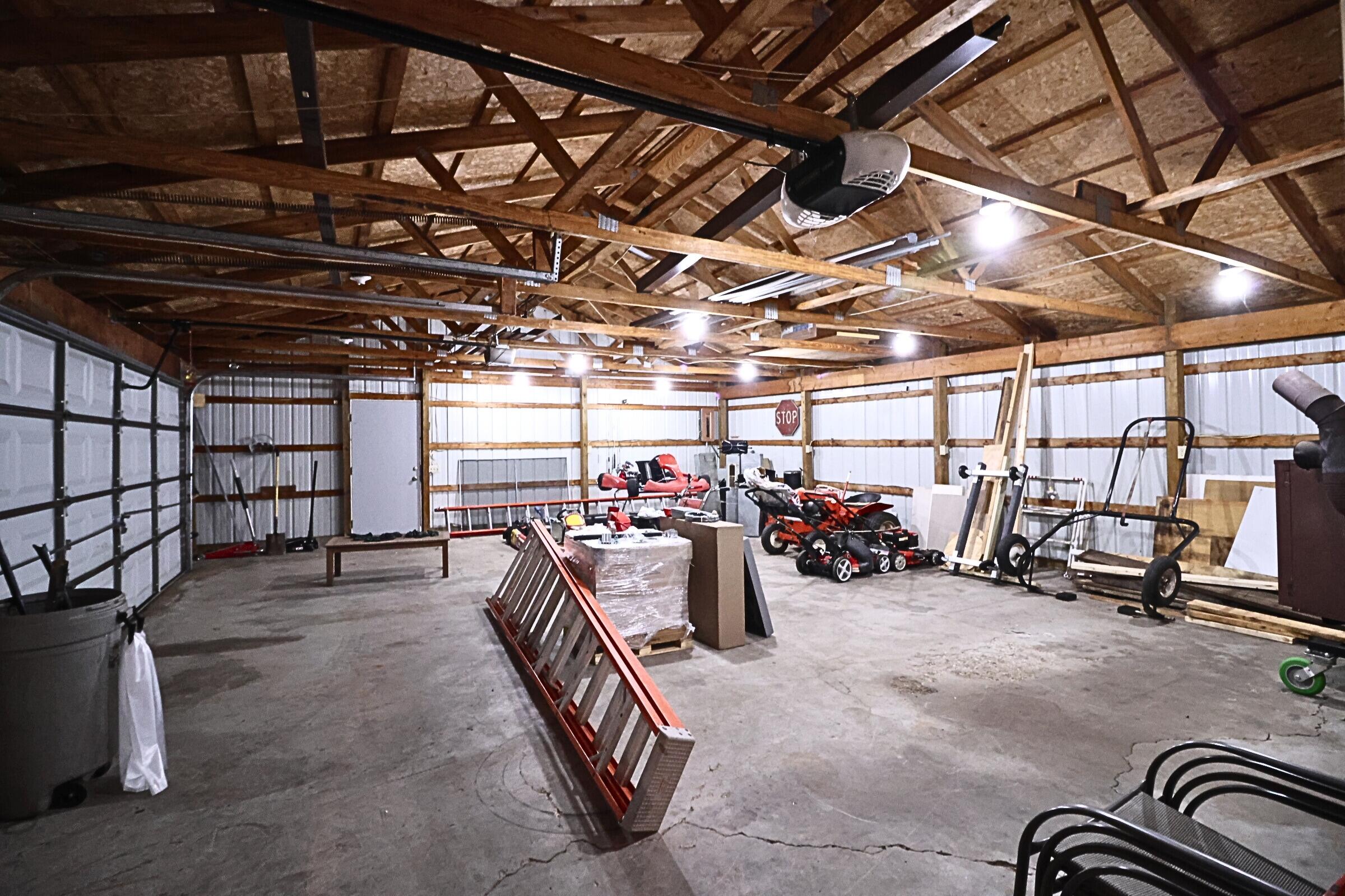 1278 West Pine Tree Road Luther, MI 49656 - Photo 21 of 29 Pole Barn view 2 two car garage side