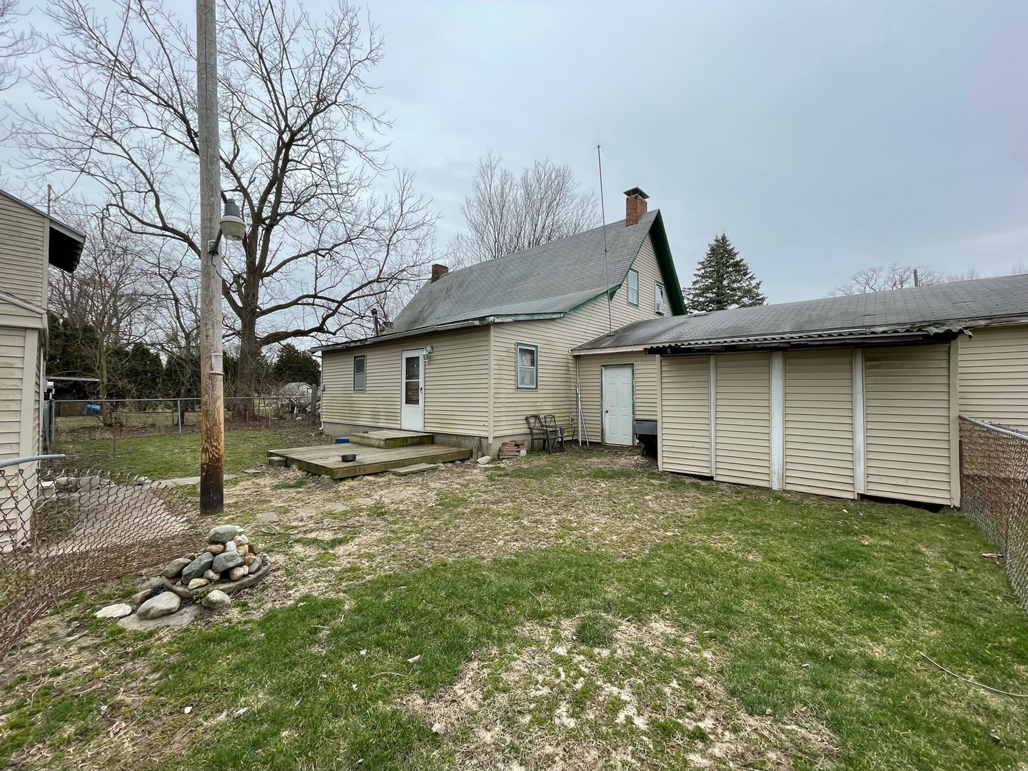 5195 Olivet Road Ridge Farm, IL 61870 - Photo 7 of 11 a view of a backyard with a tree