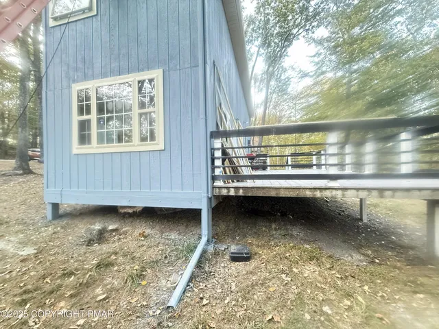 a view of swimming pool with outdoor seating
