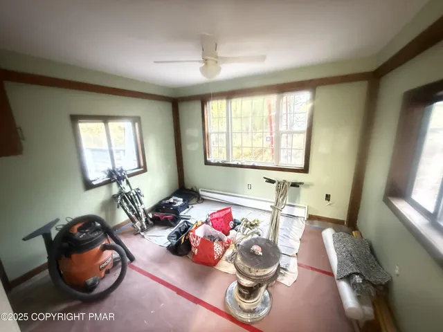 a room with furniture and a window