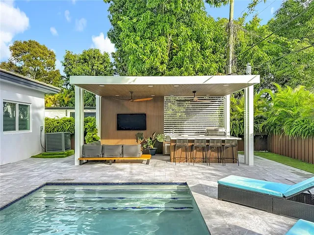 a spacious bathroom with a tub and sink