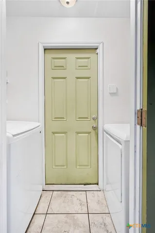 a view of workspace with wooden floor