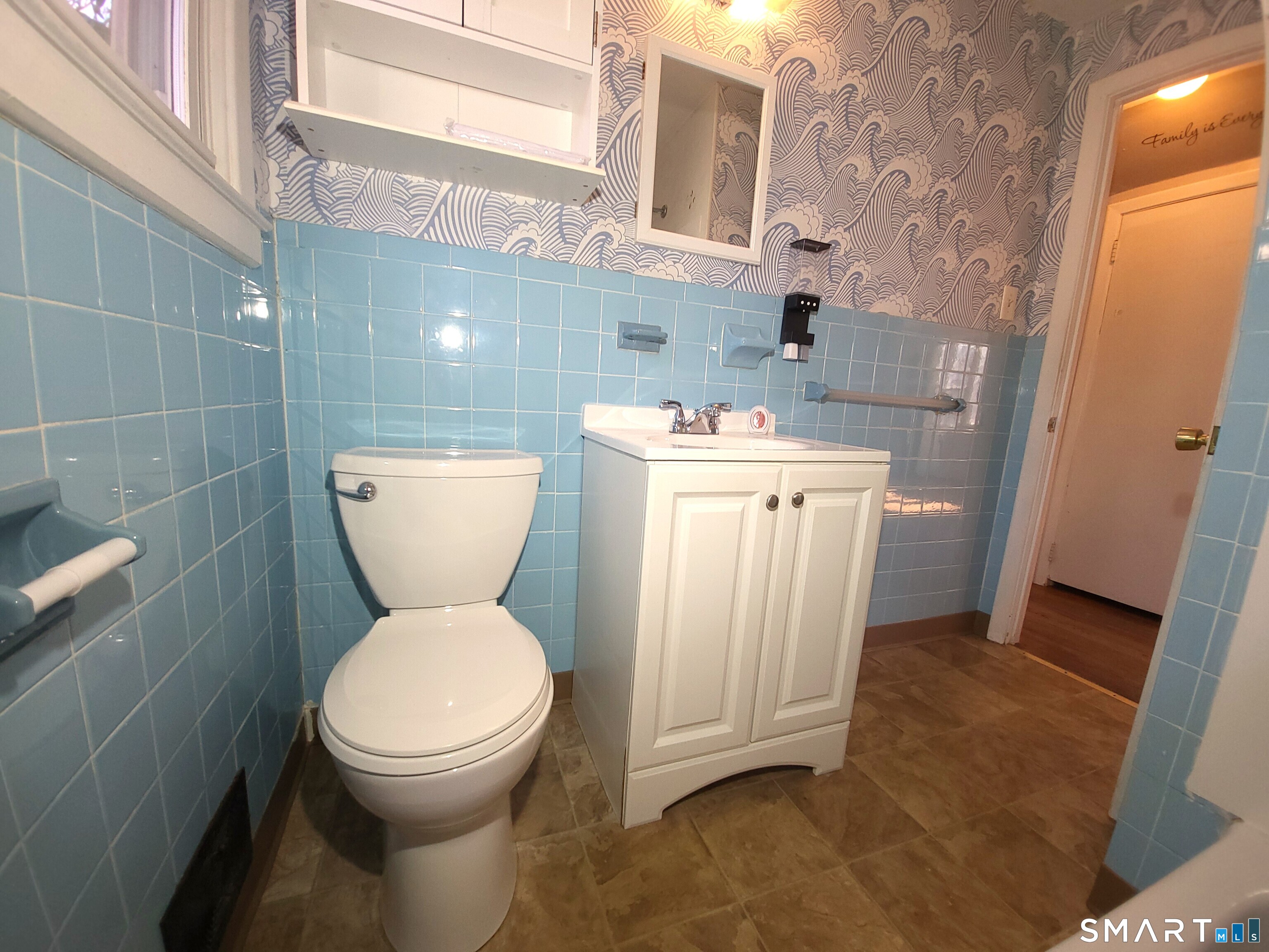 19 Bancroft Road Vernon, CT 06066 - Photo 11 of 28 a bathroom with a toilet sink and mirror