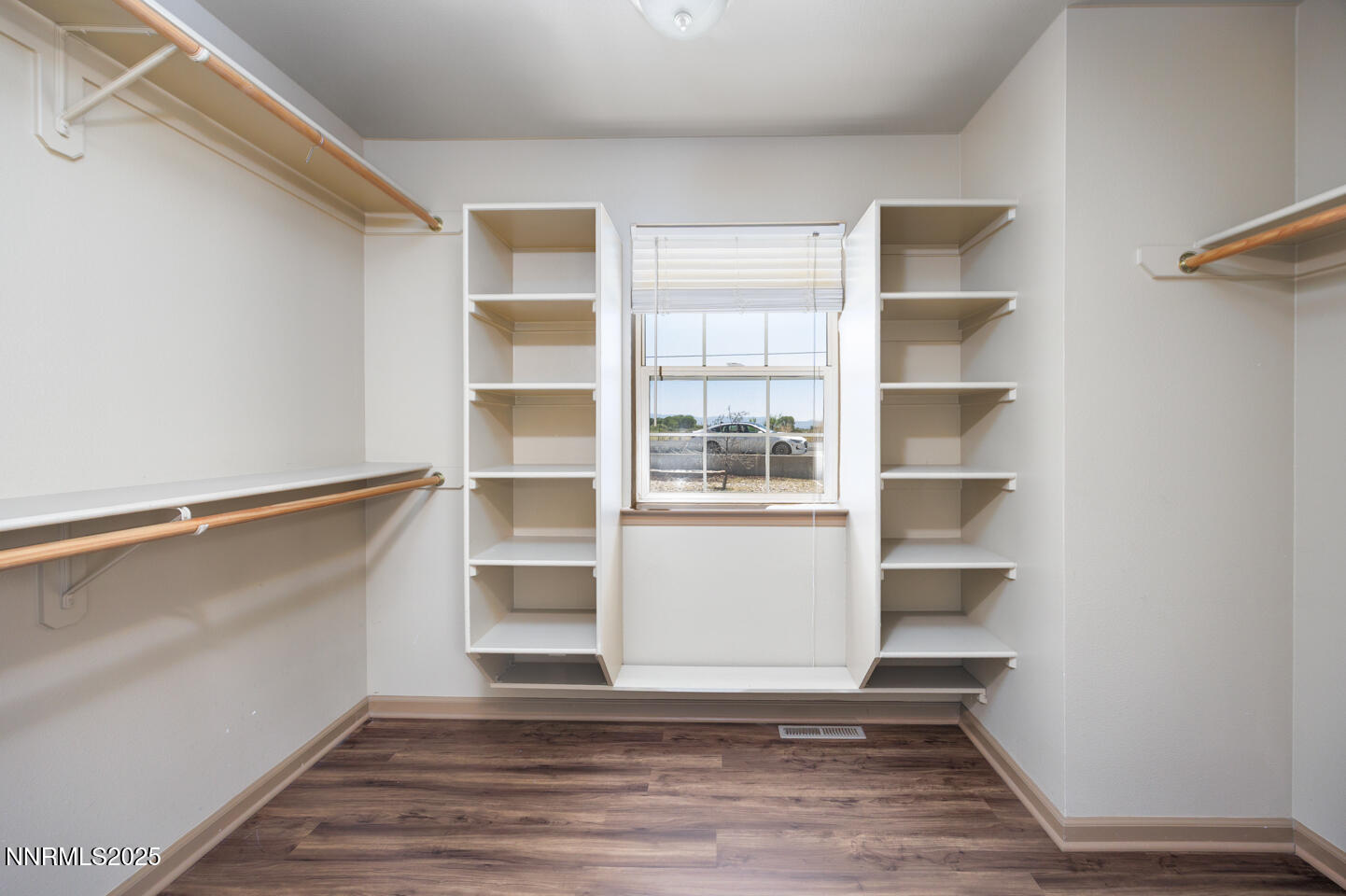 305 Cemetery Road Fallon, NV 89406 - Photo 17 of 26 a view of a room with wooden floor and windows